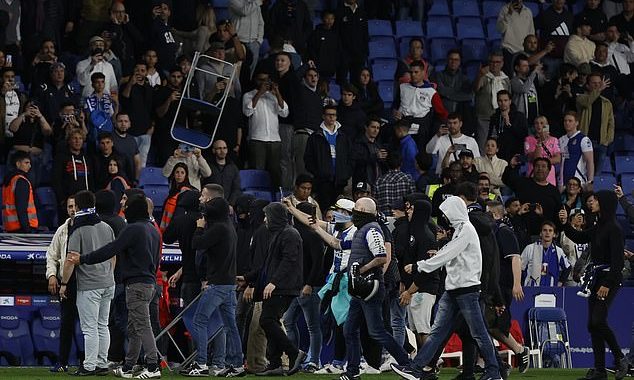 Barca players FLEE the pitch after LaLiga win as Espanyol fans storm field