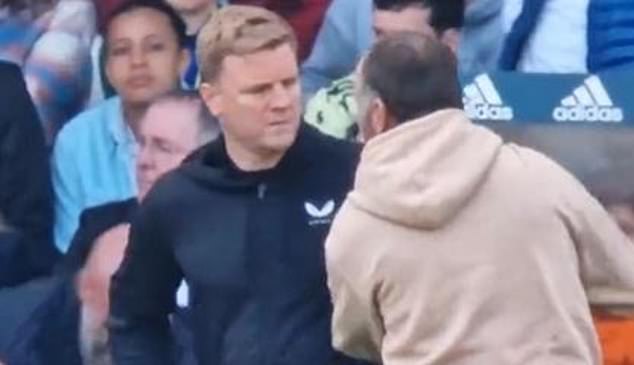 Newcastle boss Eddie Howe confronted by pitch invader during Leeds United clash